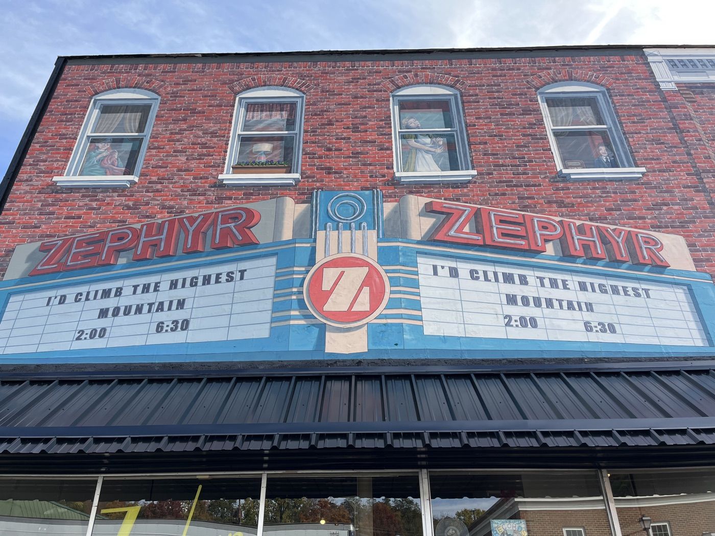 The red-brick Zephyr building on Main Street, with the ZEPHYR marquee mural across its upper front