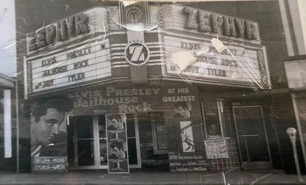 Black-and-white photo of the Zephyr Theatre, its marquee advertising Elvis Presley in Jailhouse Rock